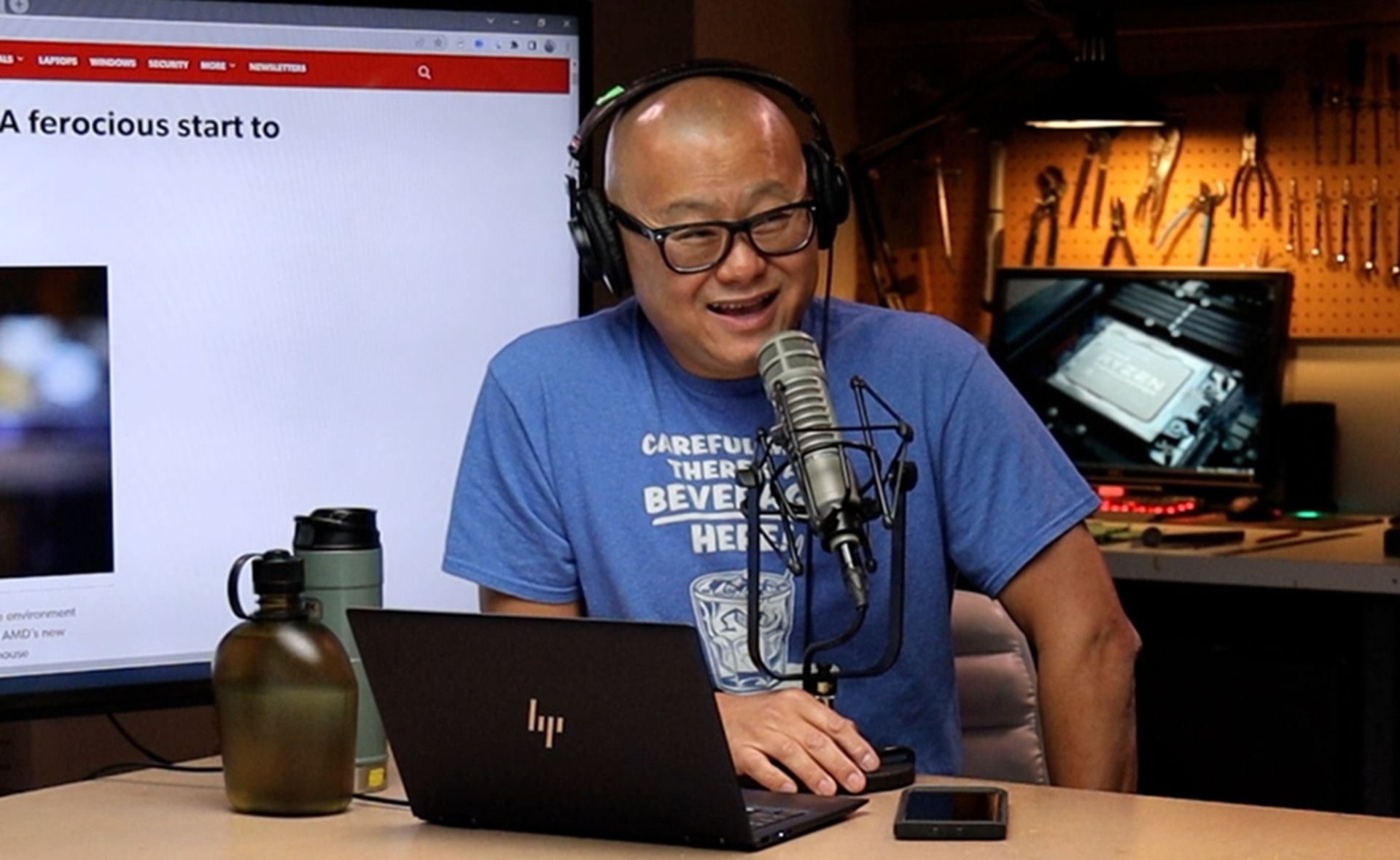 An Asian man running a podcast